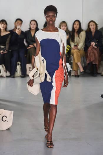 Mid length geometric blue, white and orange dress at London fashion week SS23