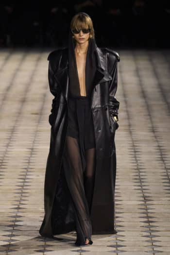 Long black leather trench coat at Saint Laurent Fashion week