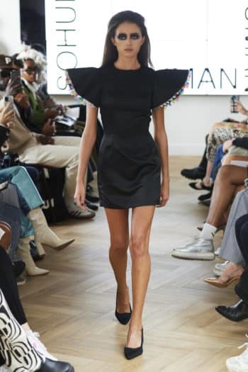 Black mini dress with shoulder detail at London fashion week SS23