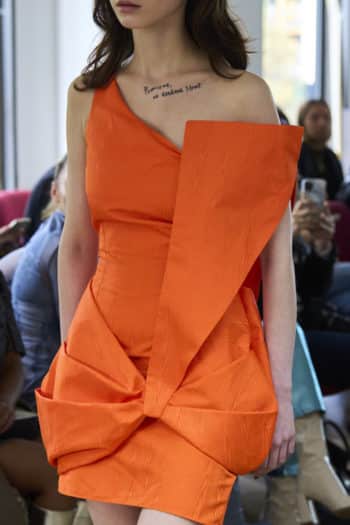 Sohuman Bright orange bow detail dress at london fashion week SS23