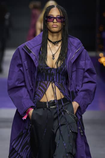 Oversize purple coat with black trousers at Milan Fashion Week SS23