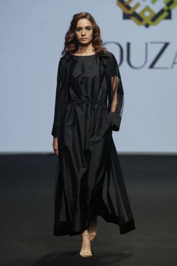 Plain black abaya at Louzan Fashion week