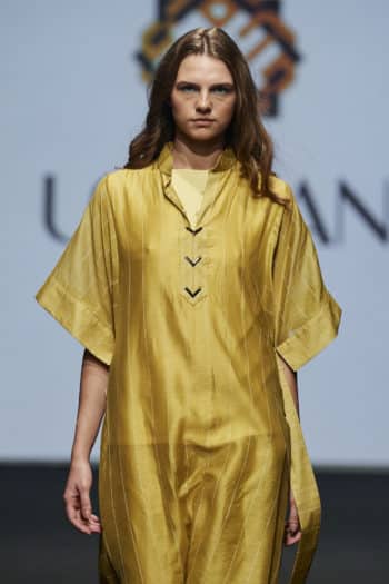 Yellow silk abaya at Louzan fashion week
