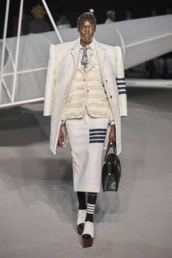 Thom Browne NYFW 2023: oversized cream blazer padded shoulders and midi skirt