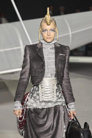 Thom Browne NYFW 2023: silver corset and cropped gray velvet jacket