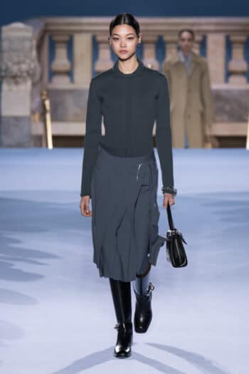 Tory Burch NYFW 2023 gray shirt and wrap skirt with black boots