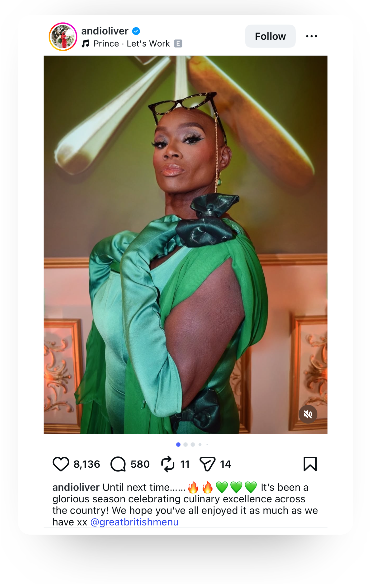 Post from Andi Oliver posing with glasses on her head, a green dress and green gloves. 